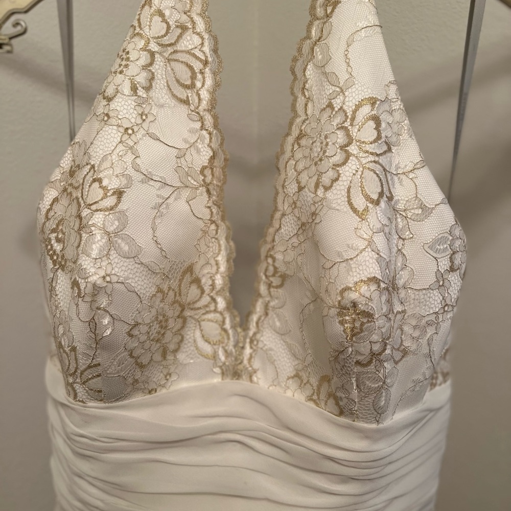 Beautiful Wedding Dress, The Color Cream with Gold Etching  through the Dress.
